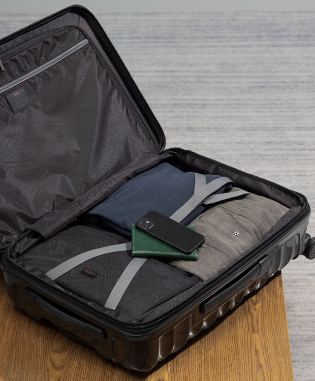 TUMI International Expandable 4 Wheeled Carry-On