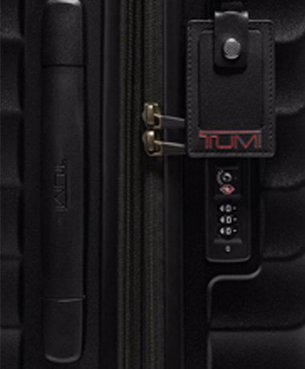 TUMI International Expandable 4 Wheeled Carry-On