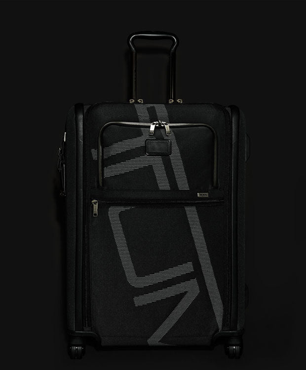 TUMI International Dual Access 4 Wheeled Carry On