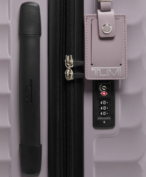 TUMI International Expandable 4 Wheeled Carry-On