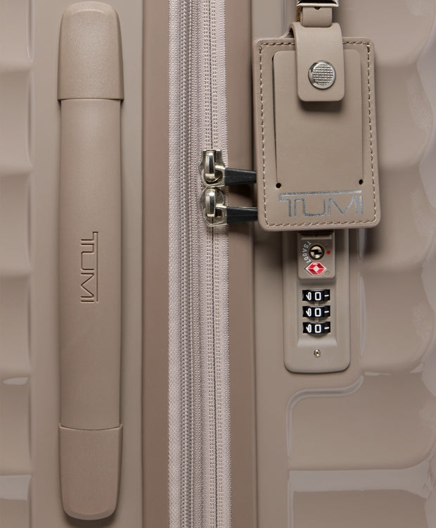 TUMI International Expandable 4 Wheeled Carry-On